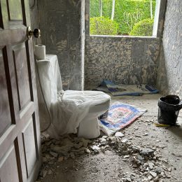 bathroom demolished tiles and wall stripped